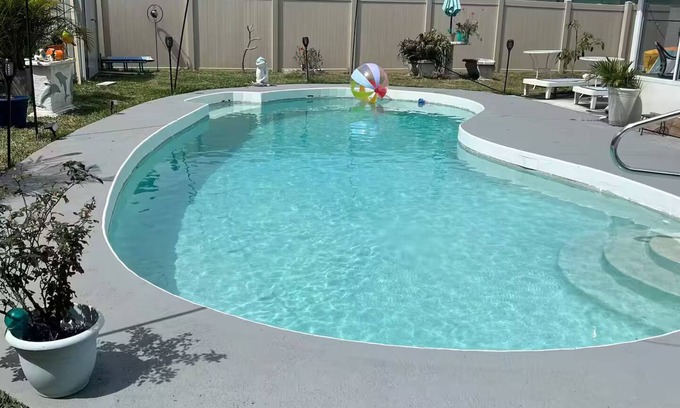 Daytona Beach House | Starfish Kisses, beautiful pool home, 8 min from beach, 12 min to speed way.
