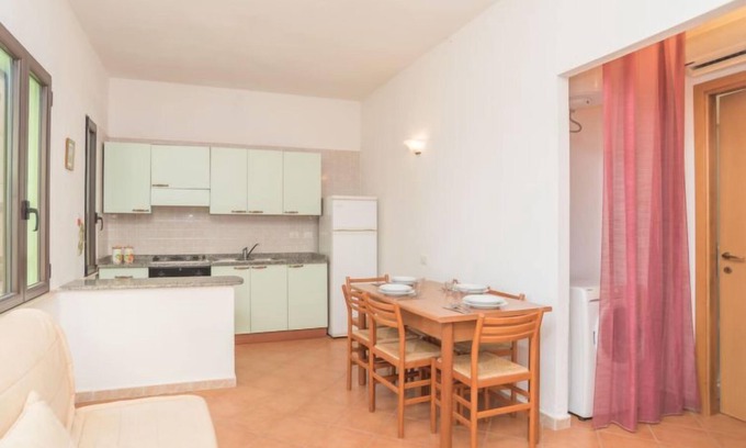 Costa Rei Apartment | Stella con piscina comune (REI100) by Interhome