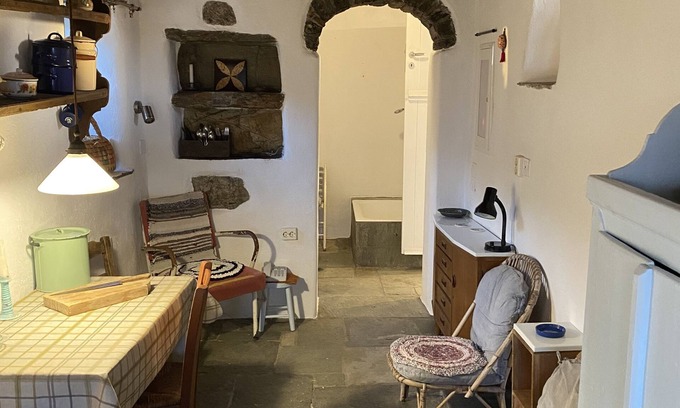 Andros Cottage | Stone-built cottage with glorious views on its own hillside