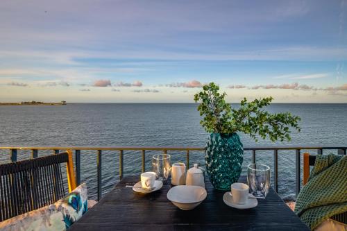 Olpenitz Apartment | Strandfeder – Moderne Ostsee-Ferienwohnung für Drei im OstseeResort Olpenitz