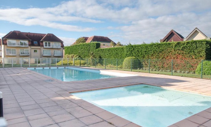 De Haan Apartment | Studio Zeeflat with parking and shared pool by Interhome