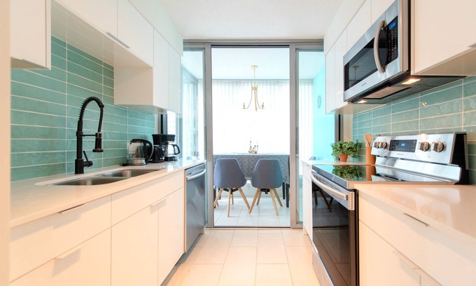 West End Apartment | Stunning 2-Bedroom Downtown Apartment with Water Views & Gym Access