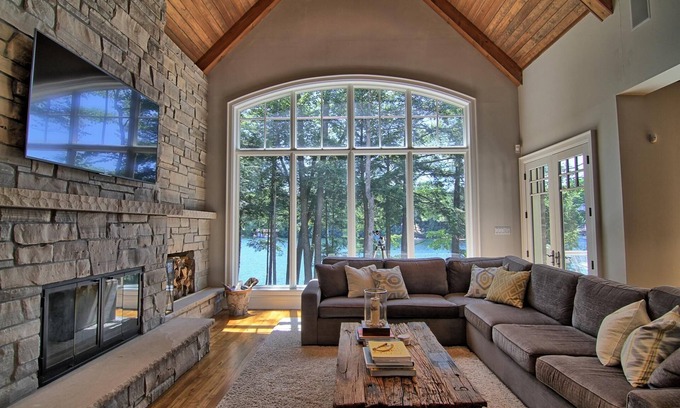 Muskoka Lakes Cottage | Stunning Cottage on Lake Joe! 6 bdrm,6 bath,2 slip boathouse! Water Toys Galore!