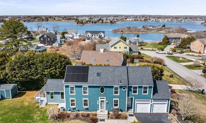 Narragansett House | Stylish coastal retreat w/water views, cozy outdoor firepit &shower, alfresco dining&more!