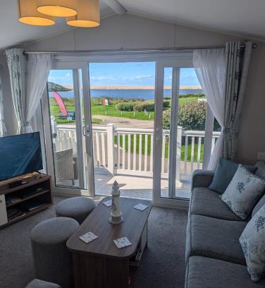 Weymouth Resort | STYLISH HOLIDAY HOME WITH UNINTERRUPTED VIEWS OF THE FLEET LAGOON ON Haven LITTLESEA HOLIDAY PARK