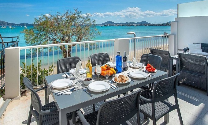 Puerto de Pollensa Apartment | Stylish Seafront Apartment, Large Balcony Overlooking Sea & Beach on Pine Walk, Port de Pollenca!