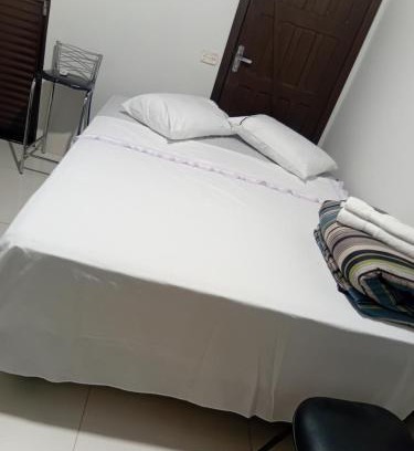 Plano Diretor Sul House | Suíte aconchegante