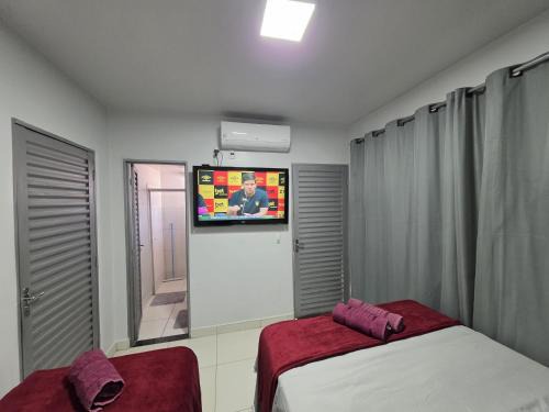 Goiania House | Suíte Privativa Climatizada Mobiliada com Garagem e Wi-Fi 2