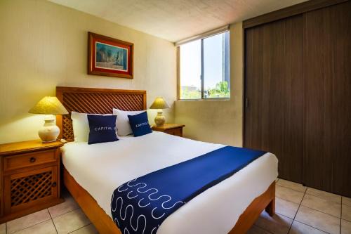 Zona Expo Hotel | Suites Navata
