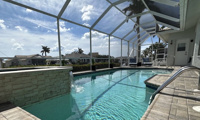 Marco Island House | Sunny Pool & Spa inside Lanai! You will Love this fully furnished 3bdrm Home!