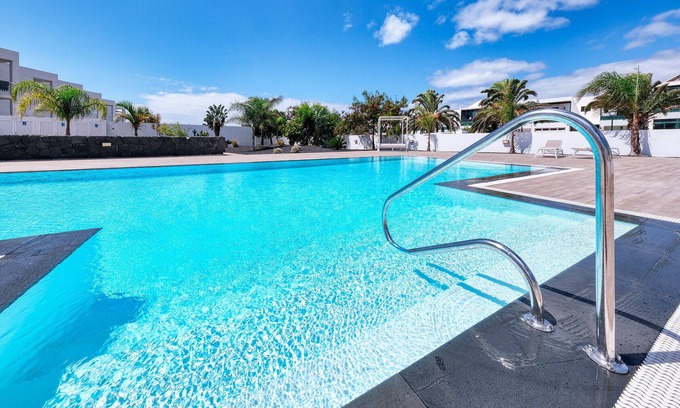 Costa Teguise Ski Chalet | Sunset View: modern, pool side holiday home