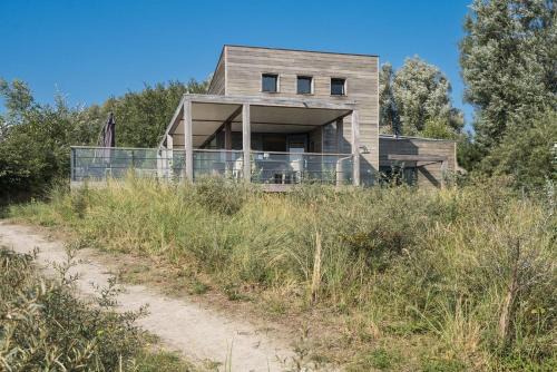 Ouddorp Villa | Super Deluxe Villa 6p - Omringd door Natuur - Villa 27