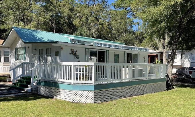 Fort McCoy Cottage | Super roomy Park Model in premier resort with lake, pools, dock and boat launch.