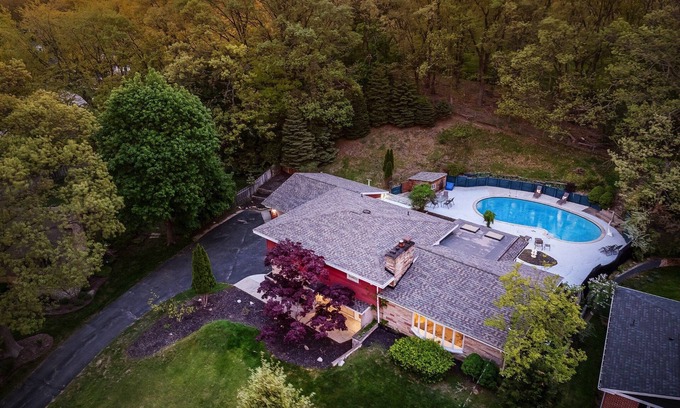 Norton Shores House | Swimming in the Woods