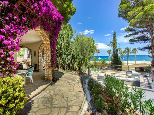Miami Platja Villa | TarracoHomes, Villa with Botanic Garden and Private Pool facing the Beach