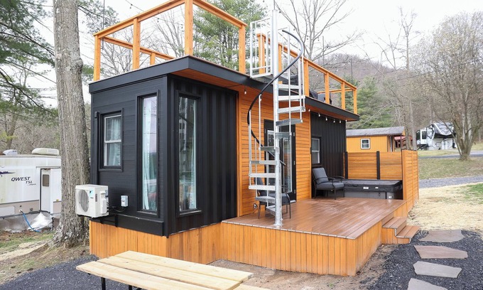 Mingoville Cabin | The Bellefonte Campground presents: The Luxury Hideaway Container Home, hot tub, Rooftop veranda, and more.