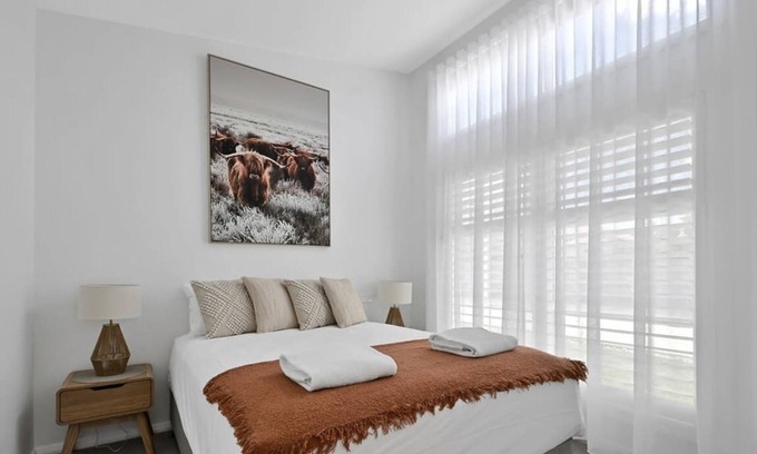 Orange Apartment | The Elm Apartments - The Cowhide Room