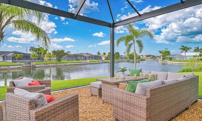 Fort Myers House | The Lily Pad + Waterfront + Pool + Golf Simulator + Movie Theater