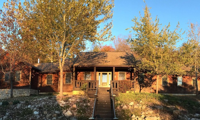 Logan Cabin | The Lodge at Harvest Moon sleeps 16 with five bedrooms and unique private Pub