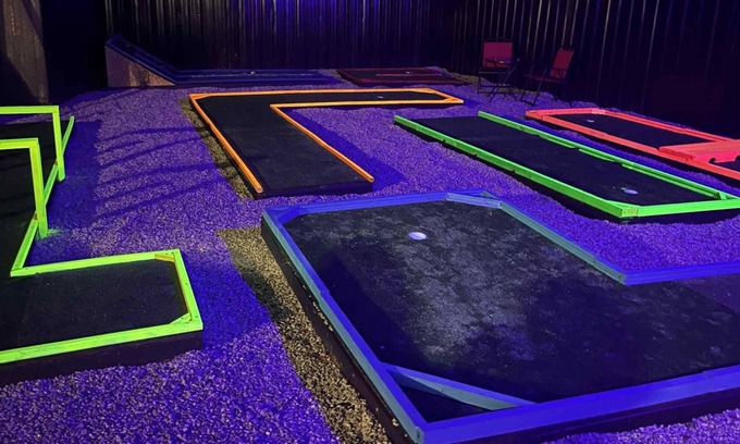 Columbus House | The Mini Golf Oasis king beds & Movie/Game room minutes to Fort Benning GA.