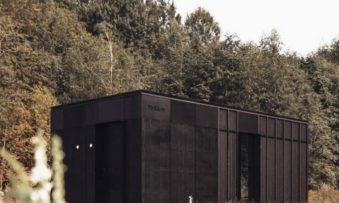 Wilsum Cabin | The Nokken Forest Cabin stands on the edge of the forest with unobstructed views over a rolling landscape. This cabin offers a lot of privacy due to its location. The large window is facing west. Enjoy the sunset over an endless cornfield from your b