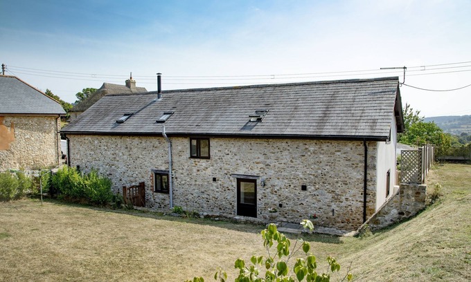 Northleigh Cottage | The Old Shippon at Bucknole Farm is a charming stone and slate barn conversion