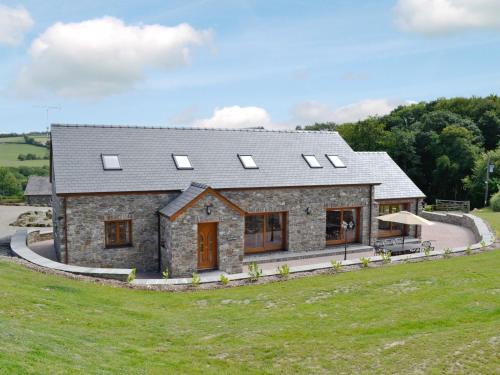 Mydroilin House | The Stable - Om4