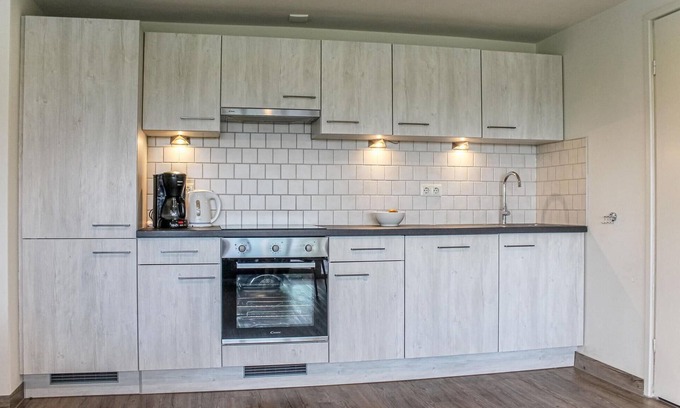 Stavenisse House | This vacation home in Zeeland is in a beautiful location near the water.