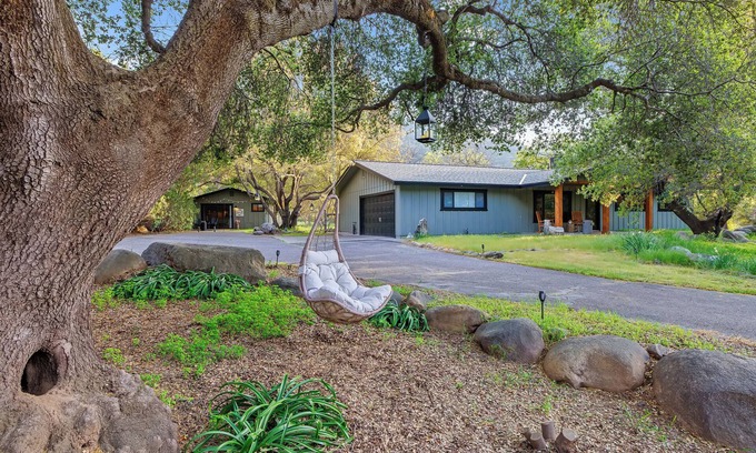 Three Rivers House | Three Oaks, an enchantingly designed home with cozy guesthouse!