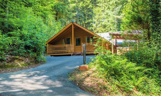 Westleigh Ski Chalet | Timber lodge set in an elevated position with views of the lake.