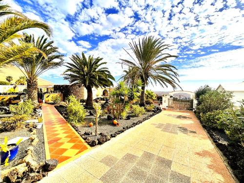 La Asomada Apartment | Tiny House MADORA - sea view - amazing garden - quiet location - Bodegas & hiking trails nearby