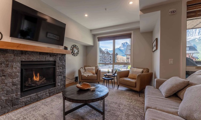 Canmore Apartment | Top floor 2 level w hot tub - Modern Mountain Oasis