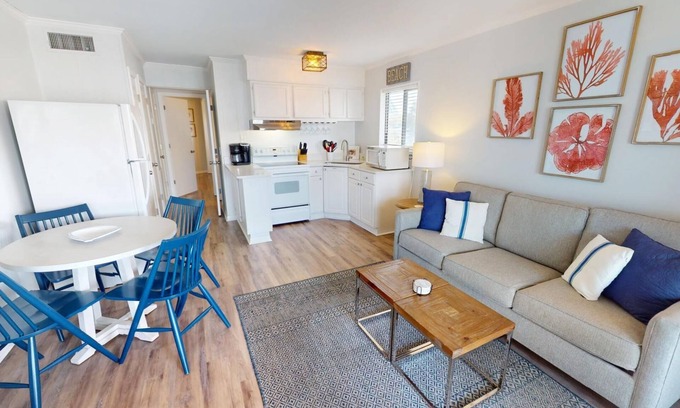 Tybee Island Condo | Top floor condo w. partial ocean + community pool views.