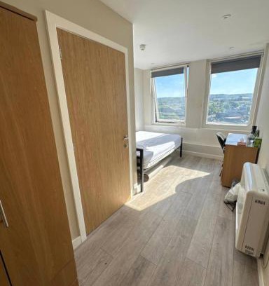 Bradford Apartment | Top-Floor Escape with City Views