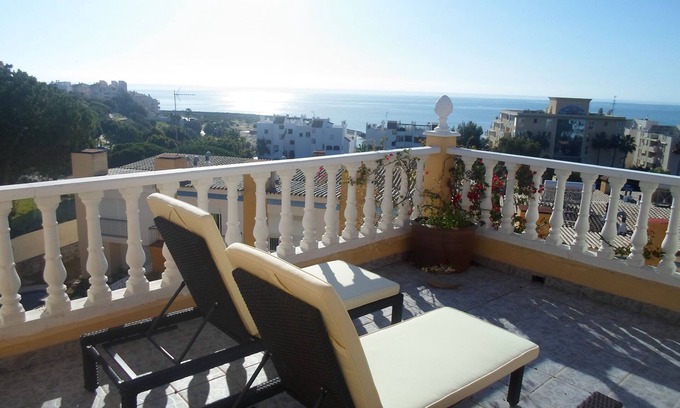 Urbanizacion Puerto de Estepona House | Town house with shared pool and stunning roof terrace, close to the beach