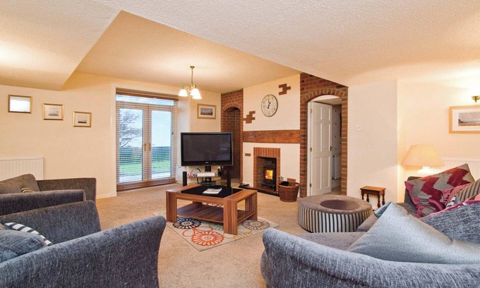 Castle Douglas Cottage | Traditional and spacious two storey farmhouse.