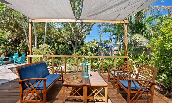 Snug Harbor Estates House | Tropical Beachside House w/Backyard Oasis, Fire Pit, BBQ & Outdoor Patio