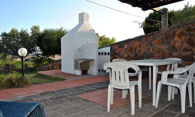 Sant'Antioco Villa | Two adjoining apartments sleeps 8/10, veranda, barbecue and olive garden