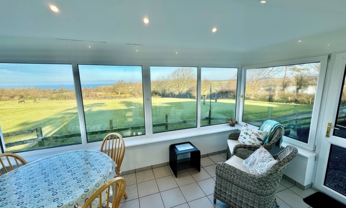 New Quay Cottage | TYDU VIEW, family friendly, with open fire in New Quay
