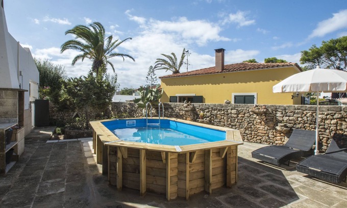 Cala Blanca Ski Chalet | Typical Menorcan house steps from the beach. Pool, garden, barbecue and fireplace