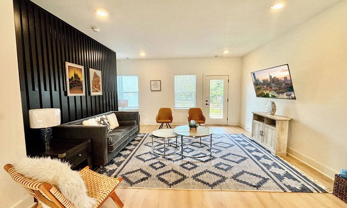 Donelson House | Unbeatable location! Your group is 10 minutes from Broadway, Opry, and East Nashville hot spots. Private game room with ping-pong, board games & TV 3 spacious bedrooms, 2.5 baths – perfect for up to 10 guests Free on-site parking and fast Wi