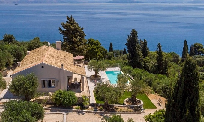 Perama Villa | Unique & Beautifully Restored Villa, A/C, Private Infinity Pool, Fitness Room & Magical Sea Views!