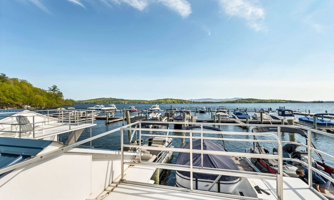 Weirs Beach Boat Rental | 🌟 Unique Houseboat Experience on Lake Winnipesaukee - Dockside! 🚤🌊