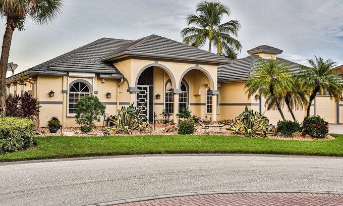 Naples House | Upscale waterfront home with private dock, saltwater pool, lanai, grill, & W/D
