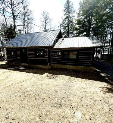 Portage Lake House | Charming Lakeside Cabin Bungalow with Timeless Rustic Beauty near Portage Lake in Maine