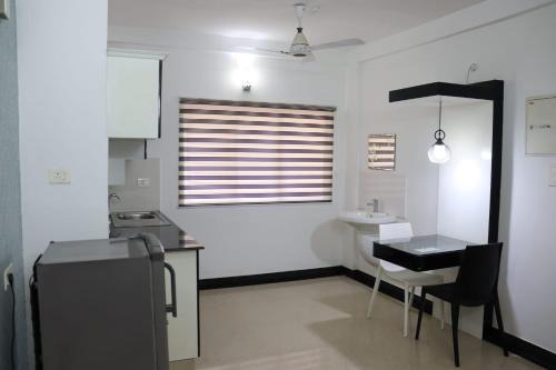 University of Kerala Senate House Campus Hotel | Uthradam towers