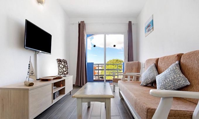 Tarajalejo Apartment | Vacation Apartment 'Buena Fuerte Apartamentos Marino' with Sea View, Shared Terrace and Wi-Fi