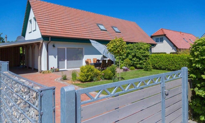 Trassenheide Apartment | Vacation home Alexander, incl. WLAN, 2 terraces & barbecue - semi-detached house