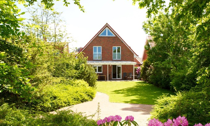 Borkum House | Vacation home Andi on Borkum with approx. 120 m² living space, terrace and garden