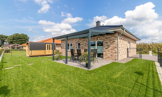 Walchum House | Vacation home for 6 guests with sauna, fireplace and lake view in Walchum